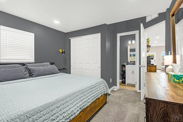 2041 Spruce St, Pueblo, CO 81004 - bedroom featuring light colored carpet, baseboards, and a closet