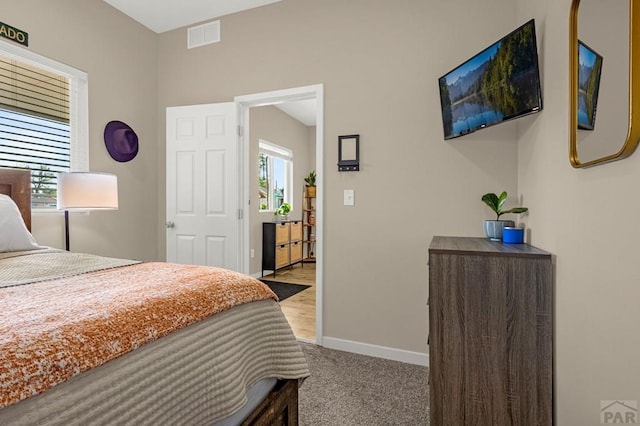 2041 Spruce St, Pueblo, CO 81004 - bedroom featuring baseboards, multiple windows, and carpet floors
