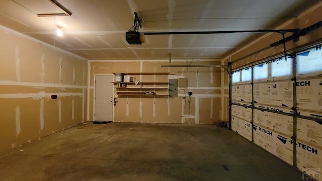 interior space with electric panel and a garage door opener