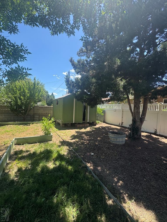 19 Cornell Cir, Pueblo, CO 81005 - fenced backyard with a shed