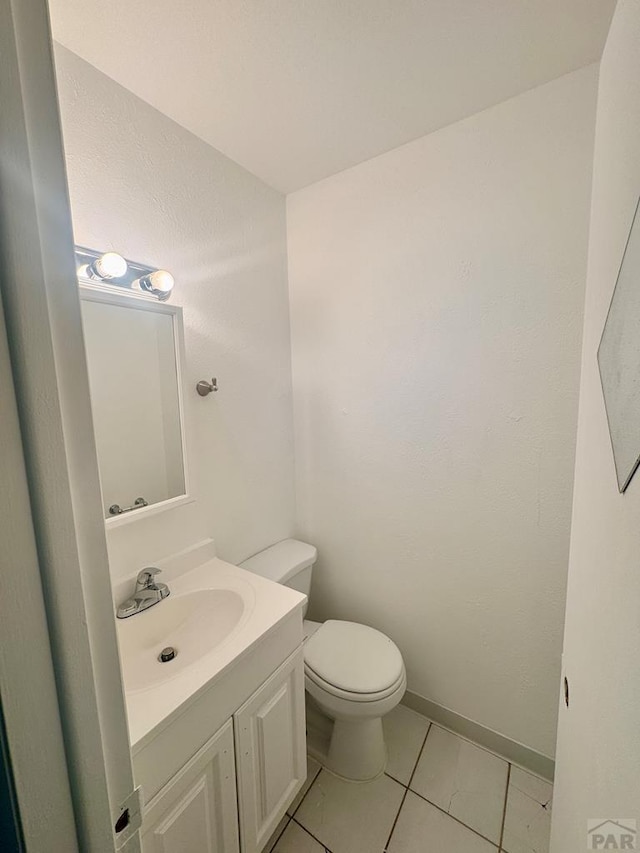 19 Cornell Cir, Pueblo, CO 81005 - bathroom with vanity and tile patterned floors