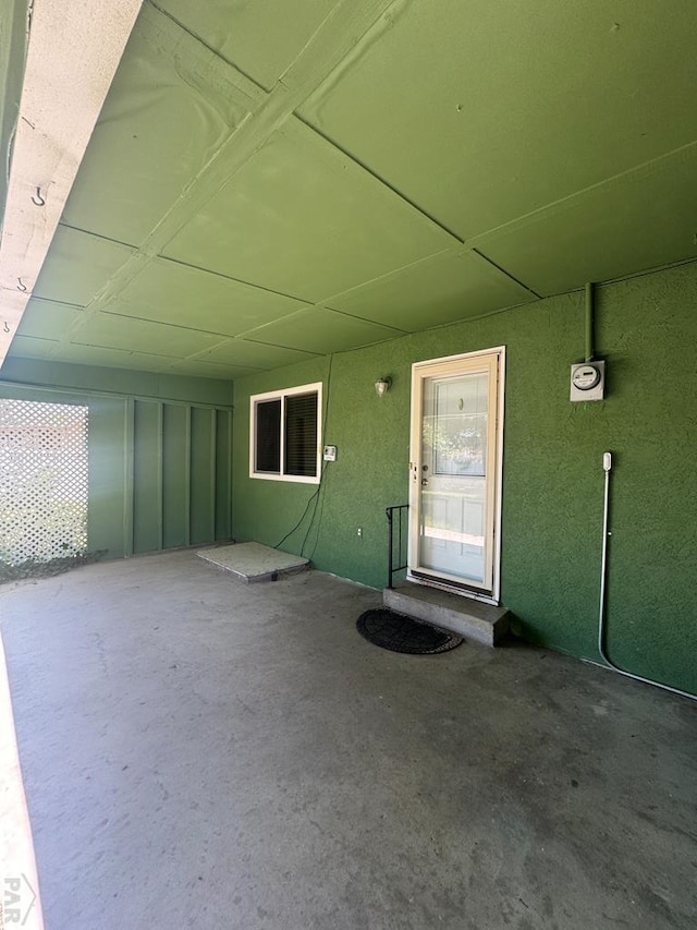 19 Cornell Cir, Pueblo, CO 81005 - property entrance with stucco siding and a patio area