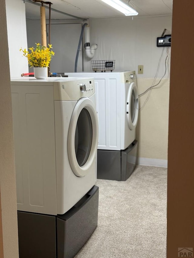 402 Alma Ave, Pueblo, CO 81004 - laundry area with independent washer and dryer and carpet floors
