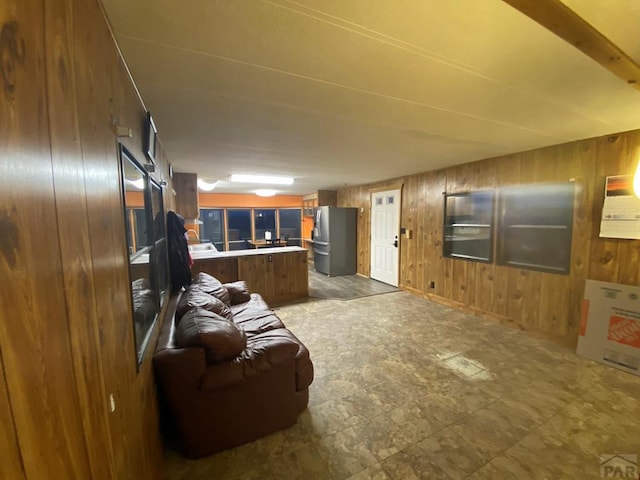 living area with wooden walls