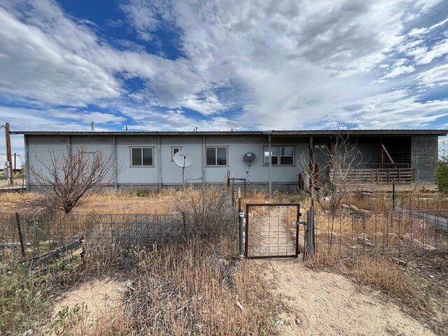 exterior space with a gate