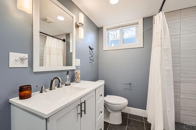 bathroom featuring baseboards, visible vents, toilet, tile patterned floors, and vanity