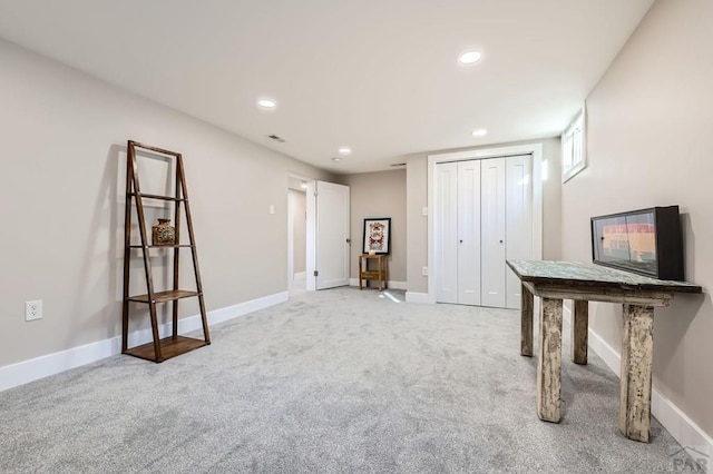 interior space featuring carpet, recessed lighting, visible vents, and baseboards