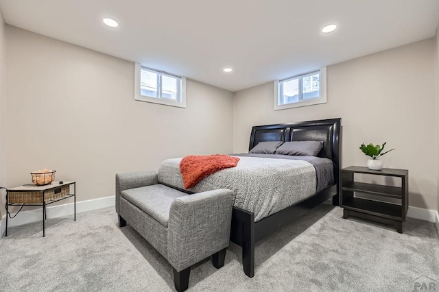 bedroom featuring carpet floors, recessed lighting, and multiple windows