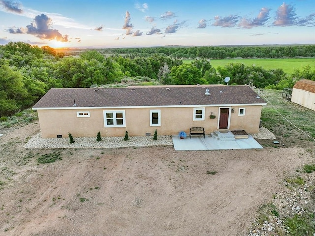 52825 E US Highway 50, Boone, CO 81025 - back of property with a patio and stucco siding