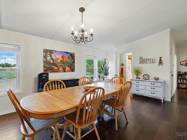 52825 E US Highway 50, Boone, CO 81025 - dining room with a chandelier, dark wood-style floors, and crown molding