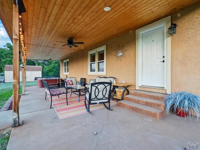 52825 E US Highway 50, Boone, CO 81025 - view of patio featuring a hot tub, entry steps, and ceiling fan