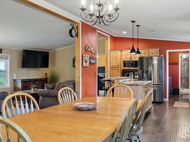 52825 E US Highway 50, Boone, CO 81025 - dining space featuring ornamental molding, dark wood-style floors, and a chandelier
