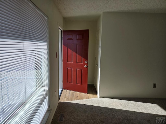 doorway to property with visible vents