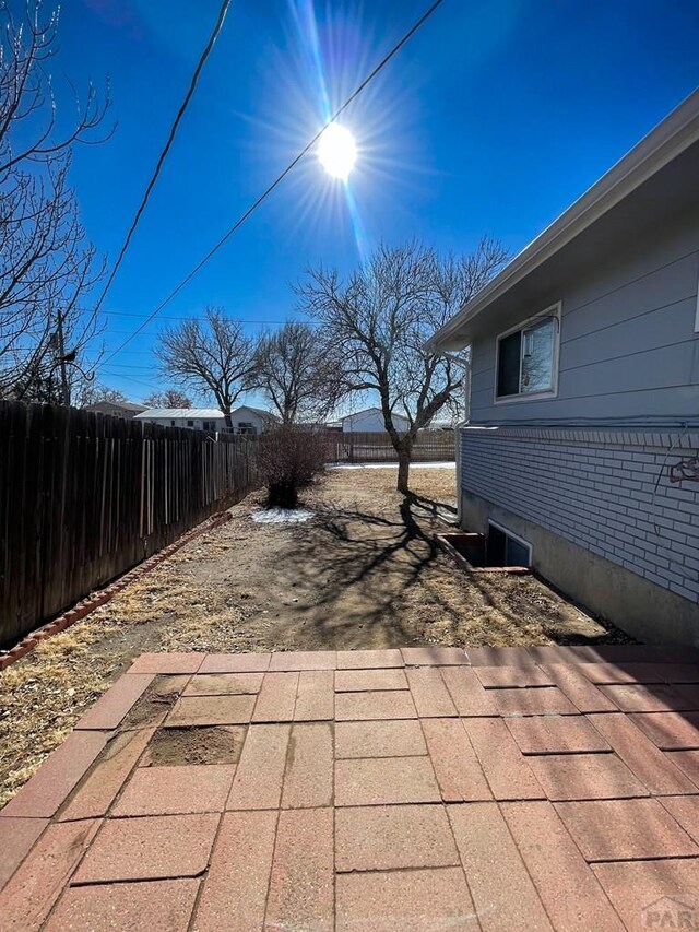 view of patio with fence