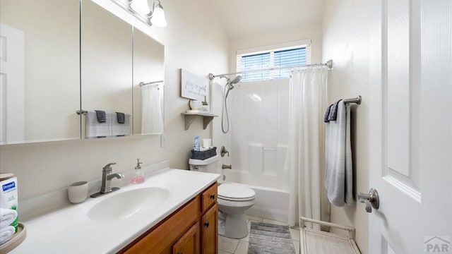 bathroom featuring shower / bath combo, vanity, toilet, and tile patterned floors