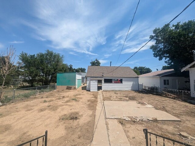 view of front of home with fence