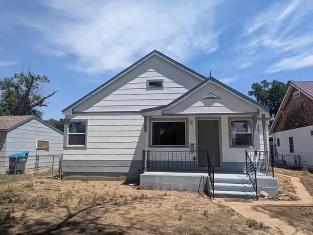 view of front of property with fence