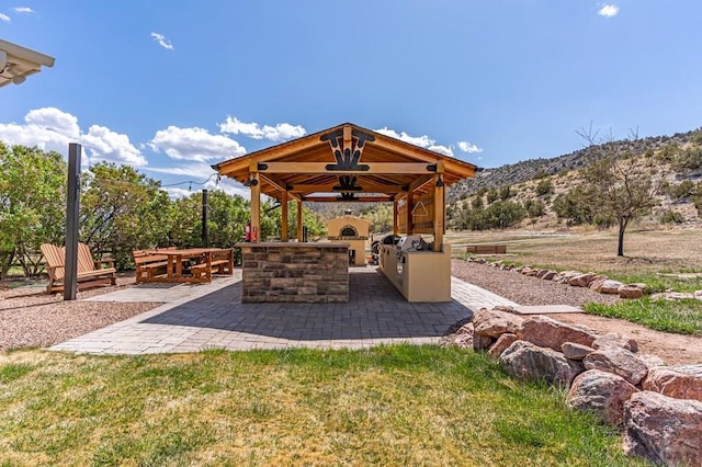 611 Rock Ridge Loop, Canon City, CO 81212 - view of patio featuring area for grilling, a gazebo, and a mountain view