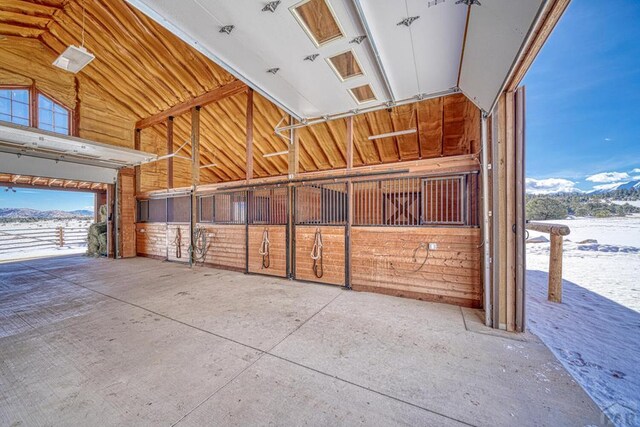 view of stable with a mountain view