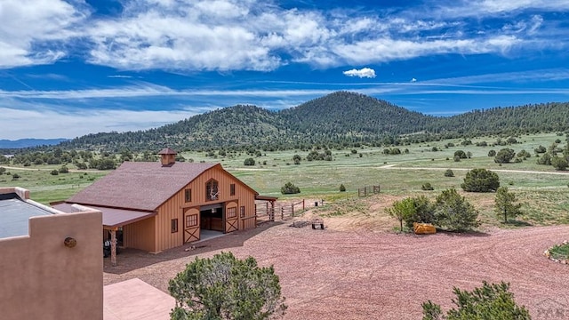 view of mountain feature featuring a rural view