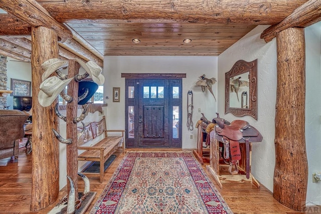 entrance foyer featuring wood finished floors, wood ceiling, and recessed lighting