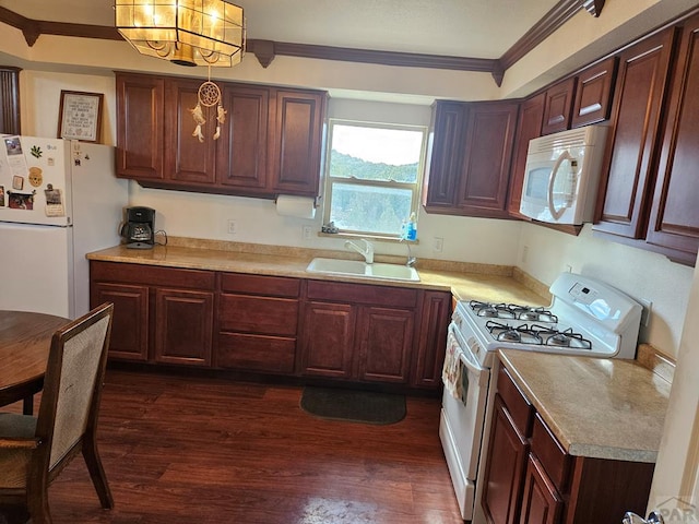 597 Piute Rd, Westcliffe, CO 81252 - kitchen featuring white appliances, a sink, a chandelier, dark wood-style floors, and light countertops