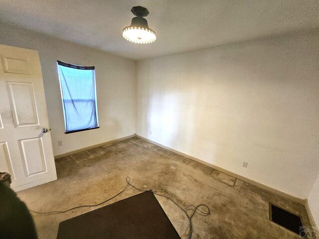 597 Piute Rd, Westcliffe, CO 81252 - carpeted spare room with baseboards