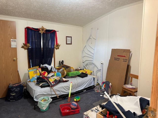 2795 Elizabeth St Unit 39, Canon City, CO 81212 - bedroom with a textured ceiling and crown molding