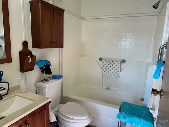 2795 Elizabeth St Unit 39, Canon City, CO 81212 - bathroom featuring toilet, vanity, and bathing tub / shower combination