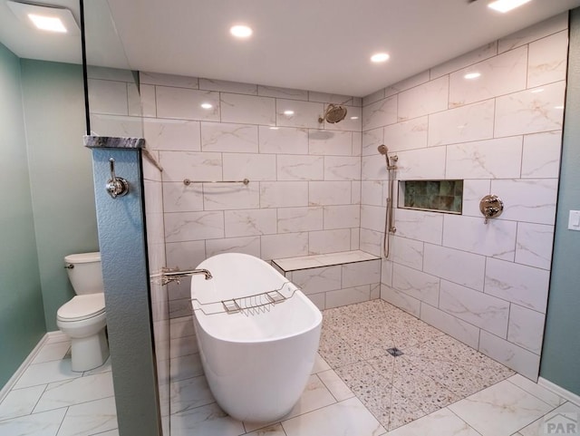 full bath with a freestanding tub, tiled shower, marble finish floor, and toilet