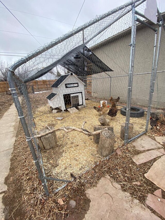 view of yard featuring an outbuilding and exterior structure