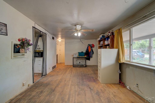 2101 Salt Dr, Colorado Springs, CO 80910 - spare room featuring a ceiling fan and wood finished floors