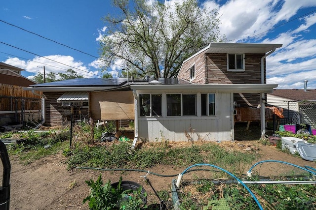 2101 Salt Dr, Colorado Springs, CO 80910 - back of property with a sunroom