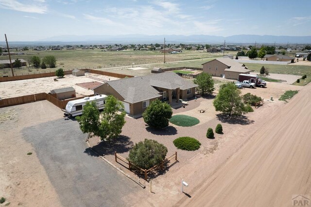 drone / aerial view featuring a mountain view