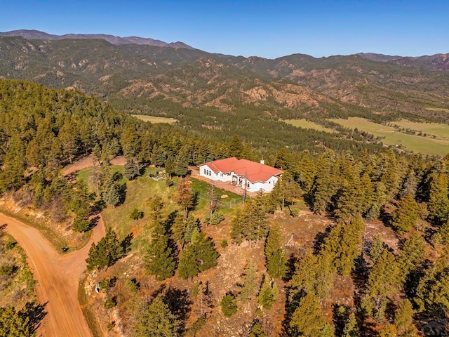 8760 Ridge Rd, Beulah, CO 81023 - aerial view featuring a mountain view and a wooded view