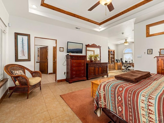 8760 Ridge Rd, Beulah, CO 81023 - bedroom with light tile patterned flooring, ceiling fan, baseboards, a tray ceiling, and ornamental molding