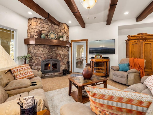 8760 Ridge Rd, Beulah, CO 81023 - living room featuring light tile patterned floors, beamed ceiling, and a fireplace
