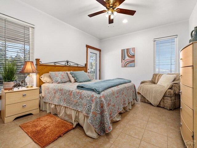 8760 Ridge Rd, Beulah, CO 81023 - bedroom featuring crown molding, ceiling fan, and light tile patterned floors
