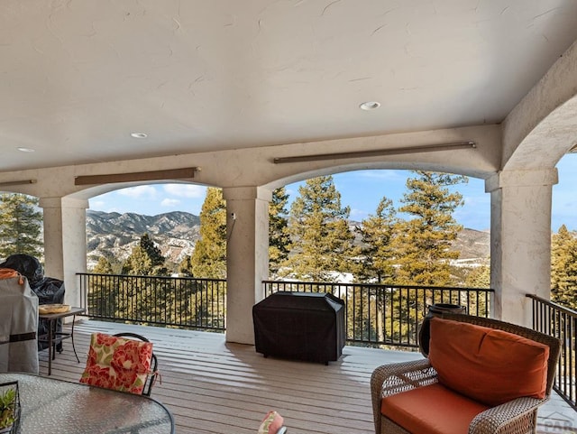 8760 Ridge Rd, Beulah, CO 81023 - wooden deck with a mountain view