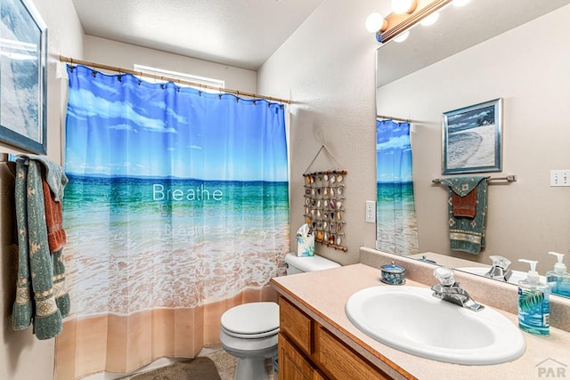 644 E Hahns Peak Ave, Pueblo West, CO 81007 - bathroom featuring toilet and vanity