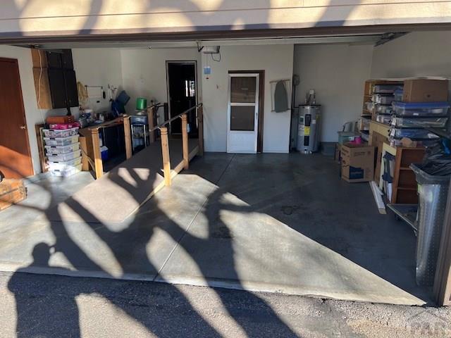 garage with electric water heater