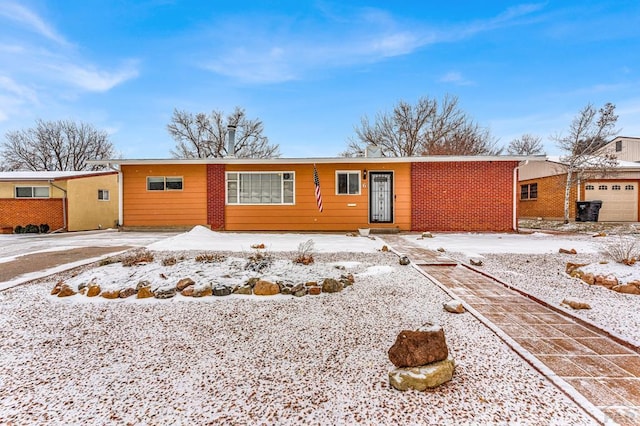 single story home featuring a garage