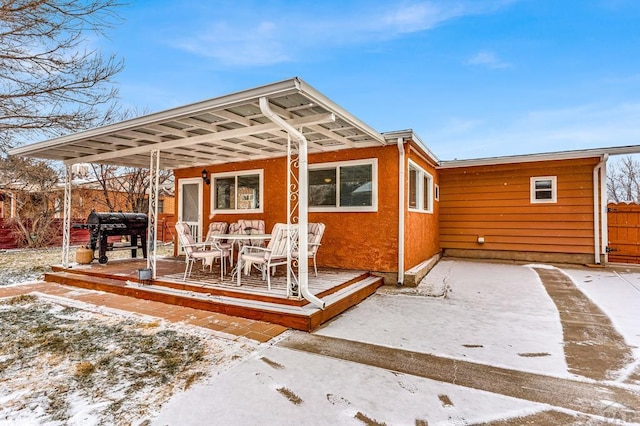 view of snow covered house