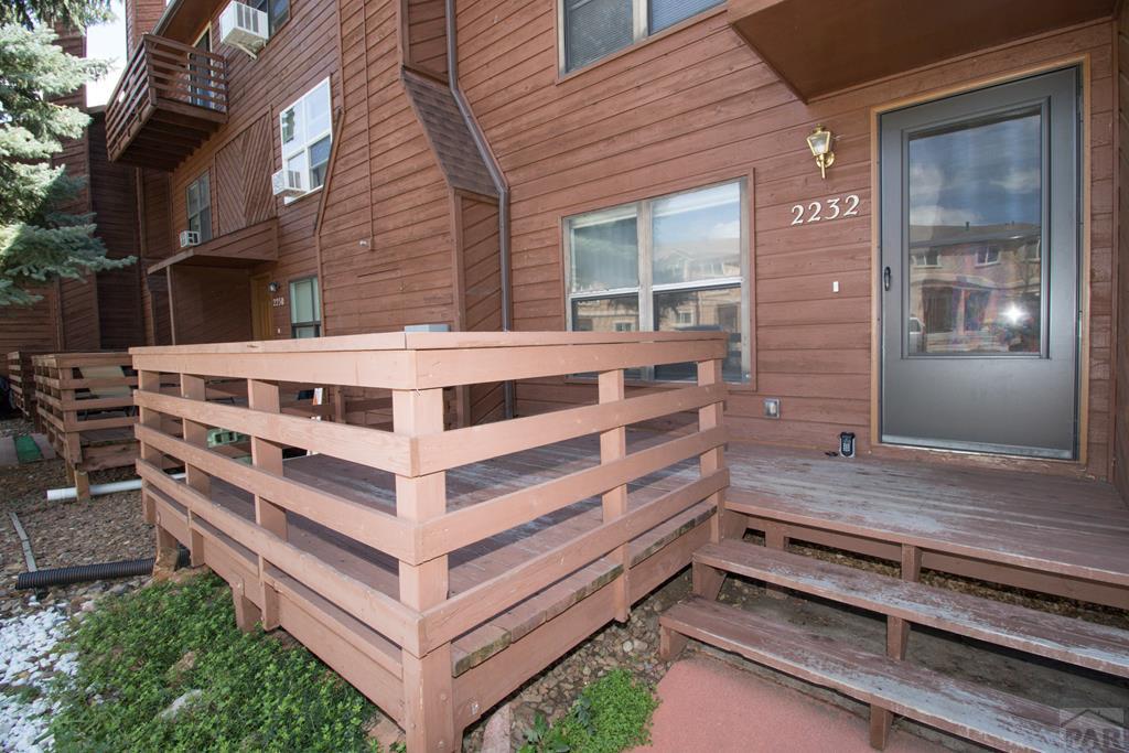2232 Stepping Stone Way, Colorado Springs, CO 80904 - view of wooden terrace