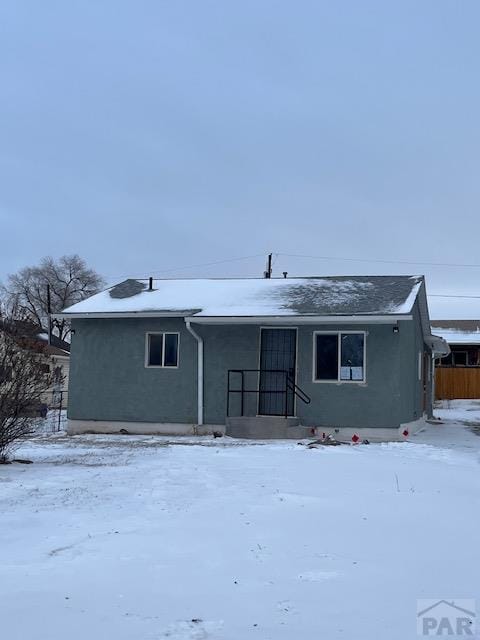 view of front facade featuring stucco siding