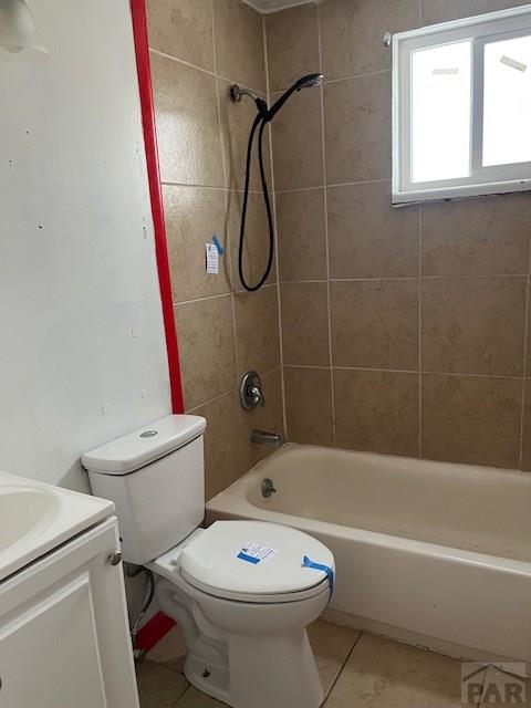 full bathroom featuring tile patterned floors, vanity, toilet, and bathing tub / shower combination