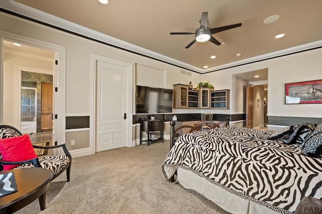 bedroom with recessed lighting, ornamental molding, and light colored carpet