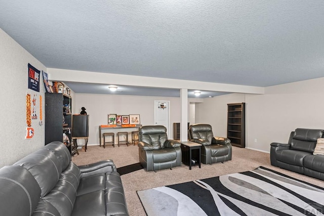 living room featuring a textured ceiling, baseboards, and light colored carpet