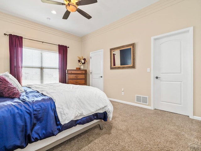 406 N Idledale Dr, Pueblo West, CO 81007 - carpeted bedroom featuring a ceiling fan and crown molding