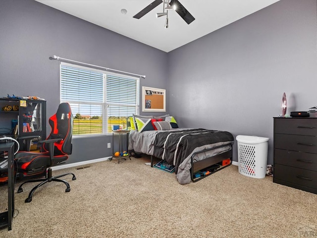 406 N Idledale Dr, Pueblo West, CO 81007 - bedroom with carpet flooring, ceiling fan, and a desk